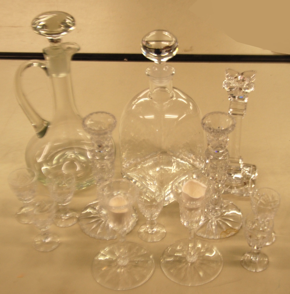 A PLAIN GLASS CLARET JUG, A LARGE DIMPLED GLASS SQUARE DECANTER, TWO PAIRS OF CUT GLASS CANDLESTICKS