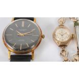 GENT'S SEKONDA DE LUXE, GOLD PLATED WRIST WATCH, with 23 jewel movement, black circular dial with