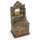 CONTINENTAL FILIGREE DECORATED MINIATURE DRESSING CHEST, the high back fitted with a mirror, the
