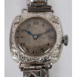 ETHIC WATCH CO., LADY'S 14k WHITE GOLD WRIST WATCH, with 17 jewel Swiss movement, silvered