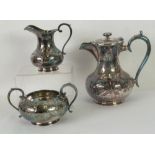 VICTORIAN EP TEA SERVICE OF 3 PIECES, pear shaped and foliate engraved viz TEAPOT, MILK JUG and