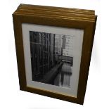 SET OF SEVEN BLACK AND WHITE PHOTOGRAPHIC PRINTS OF ARCHITECTURE AROUND MANCHESTER , IN WHITE MOUNTS
