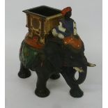 AN INDIAN PAINTED TERRACOTTA MODEL OF AN ELEPHANT WITH HOWDAH