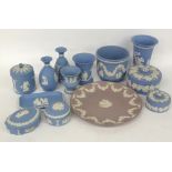 TWELVE PIECES OF WEDGWOOD PALE BLUE AND WHITE JASPERWARE, MAINLY BOXES AND VASES AND A DITTO