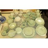 A LARGE QUANTITY OF WEDGWOOD 'CELADON POTTERY DINNER AND TEA WARES, 'WINDSOR GREY AND WOODS WARE '