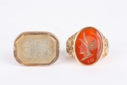 A 9ct gold hardstone seal ringtogether with a gold plated hardstone seal fob engraved with a