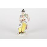 A late 20th century Meissen figure
after Elias Meyer, modelled as a seated Japanese lady feeding
