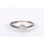 An 18ct white gold and diamond solitaire ring
set with diamond measuring approx. 1/2 carat and set