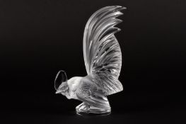 A modern Lalique 'Coq Nain' clear glass car mascotthe cockerel with tail raised and resting on a