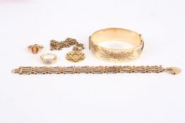A collection of gold jewellerycomprising a 9ct gold five bar gate bracelet, a 9ct gold Star of