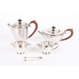 A two piece silver tea set
hallmarked Birmingham 1949, comprising teapot and hot water jug, with