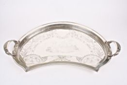A large American silver plated two handled fan-shaped butlers traythe centre engraved with a
