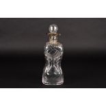 An Edwardian silver mounted glass decanter and stopper
hallmarked London 1907, with wrythen