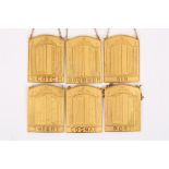 Six Sporrongs gilt metal decanter labels
the front of each arched label with embossed image of