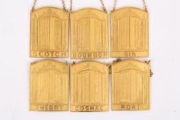 Six Sporrongs gilt metal decanter labelsthe front of each arched label with embossed image of