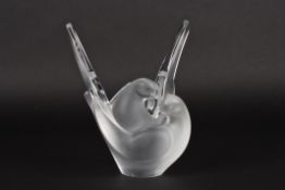 A Lalique frosted glass vase depicting love birdsin curled pose with tails raised, signed