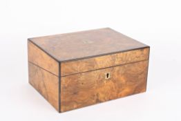 A late 19th century burr walnut veneered writing slopeopening up to reveal pen tray and single