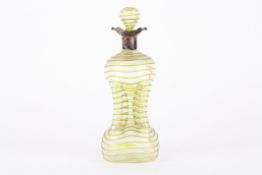 A late 19th century silver topped glass decanterthe pinched glass body with applied lime green
