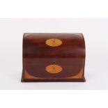An Edwardian mahogany inlaid stationery box
the domed top lid and front with oval fan inlay, opening