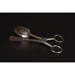 A pair of George IV silver egg tongs
hallmarked London 1829, of plain form with looped handles,