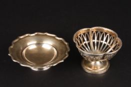 Two small silver bonbon dishesone of petal form hallmarked Birmingham 1946 by Adie brothers, the