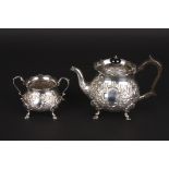 A Victorian two piece tea set, 
hallmarked London 1898, comprising a teapot and sugar bowl, with