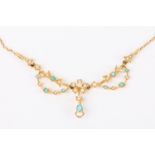 An Edwardian 18ct gold turquoise and pearl garland necklace
the central floral pearl cluster between