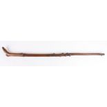 A Victorian walking stick with carved ladies boot
the handle carved in the form of a boot, with