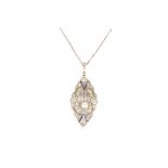 A delicate Edwardian sapphire, diamond and pearl pendant
the pendant scroll set with sapphires and