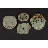 A 20th century Chinese celadon jade carved and pieced floral plaque, another pierced and carved