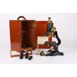 A monocular microscope by Watson & Sons
on Y shaped base with adjustable arm, monocular body tube