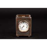 A George V miniature silver carriage clock
hallmarked London 1912, the case with engine turned