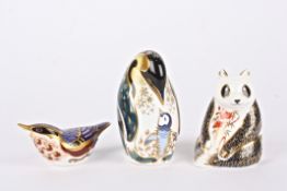 Three Royal Crown Derby animal paperweightsa penguin, panda and nuthatch, two with gold stoppers,