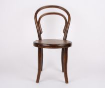 A Thonet style childs bentwood chairmade by Fischel, Czechoslovakia, with solid seat and curved