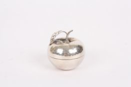 An unusual hammered silver novelty pin box in the form of an applepossibly South American,