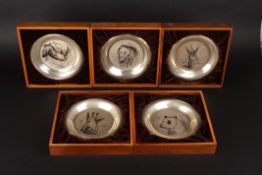 A set of five 1970s engraved silver animalier plates by Bernard Buffetall numbered in original