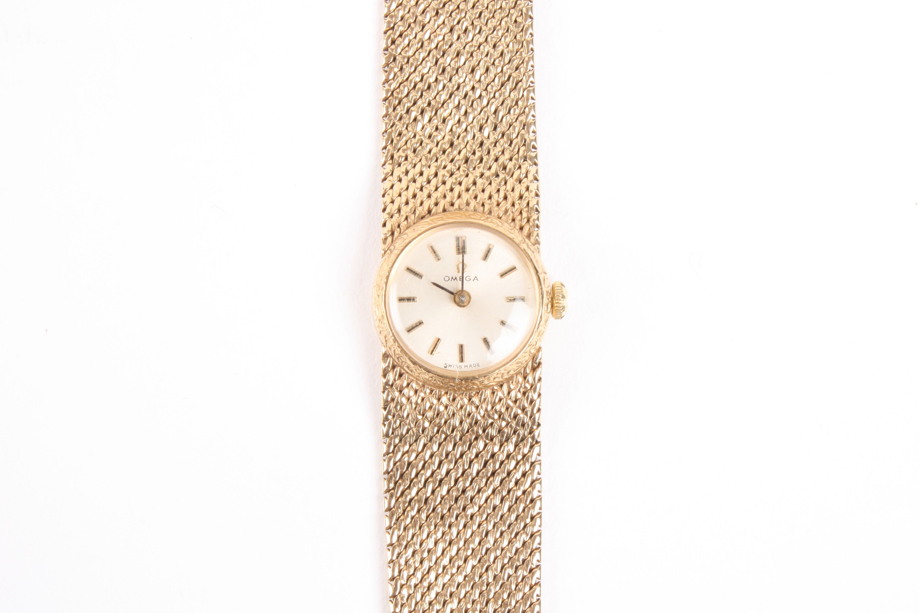 A 9ct gold ladies Omega wrist watch
the circular dial with baton numerals, with a woven gold - Image 2 of 2