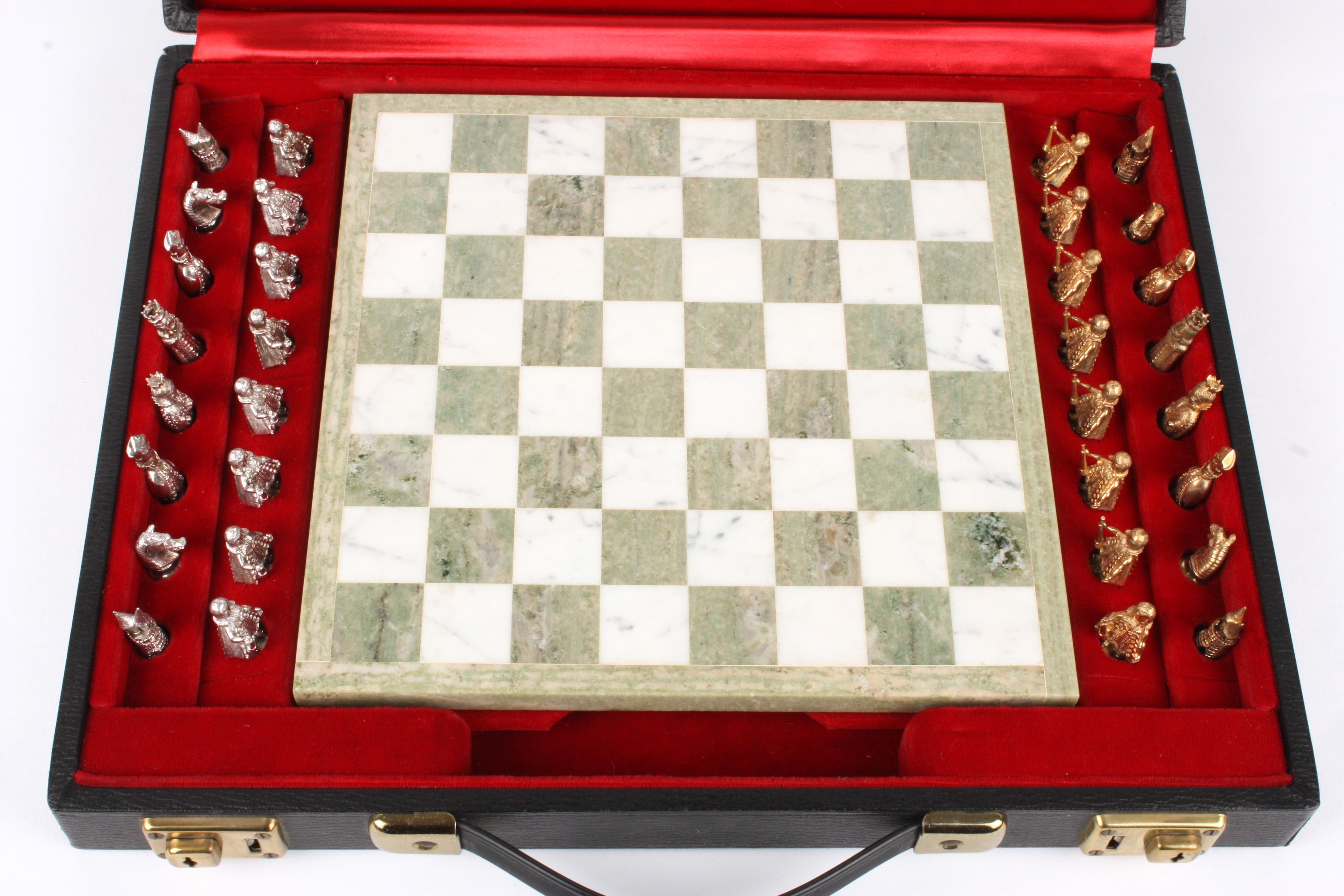 An unusual 20th century 9ct white and yellow gold chess set
hallmarked London 1969, the pieces