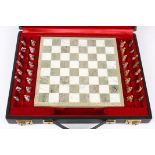 An unusual 20th century 9ct white and yellow gold chess set
hallmarked London 1969, the pieces