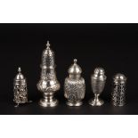 A collection of 5 antique silver pepperettes
including a London 1794 embossed pepperette, two with