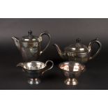 An early 20th century silver plated Viners four piece tea set
comprising teapot, hot water jug, milk