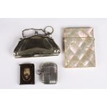 A small group of objets d'art
comprising of a mother of pearl calling card case, a silver cross