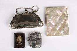 A small group of objets d'artcomprising of a mother of pearl calling card case, a silver cross