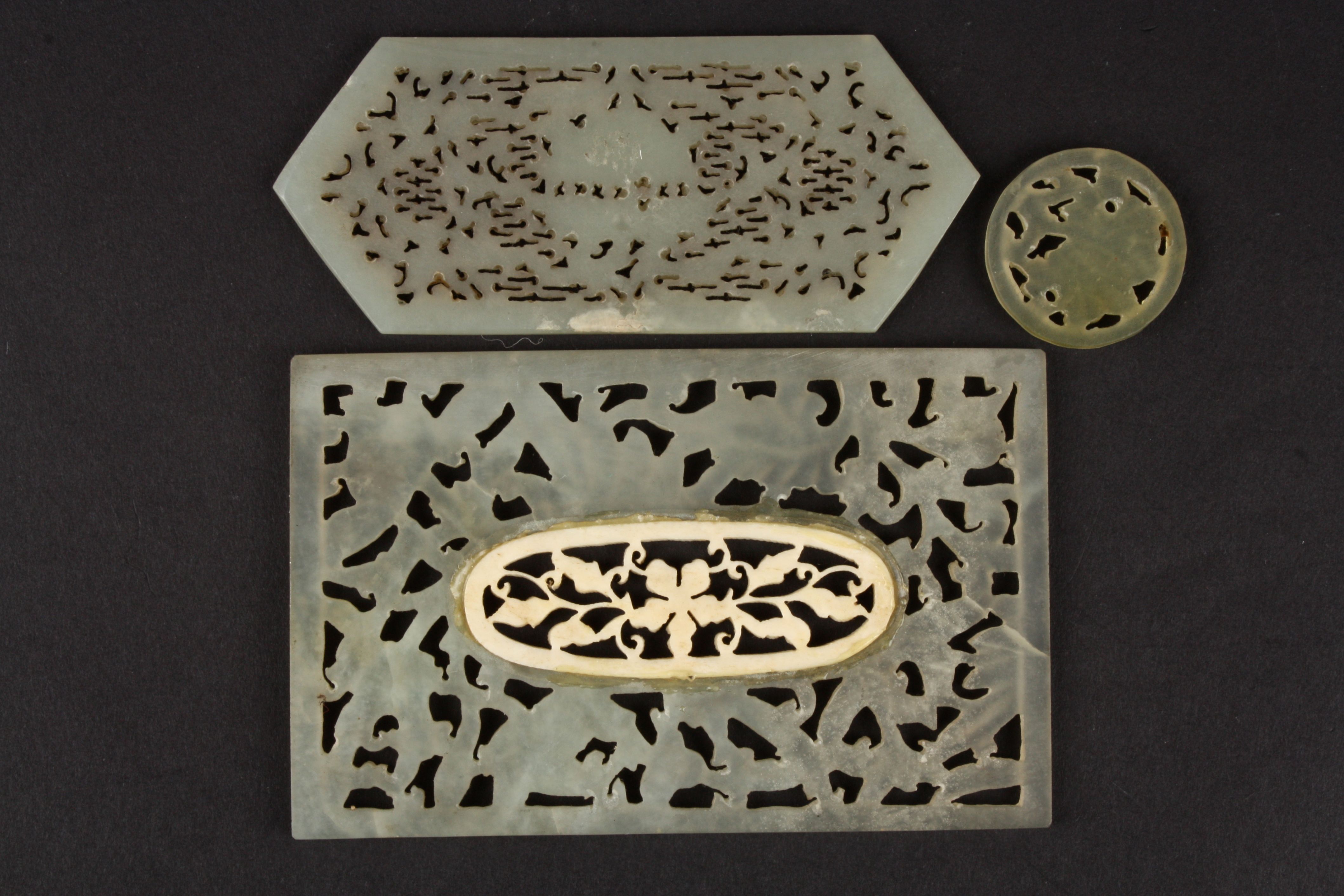 A Chinese 20th century pale jade carved rectangular panel
with central pierced floral inset, another - Image 2 of 2