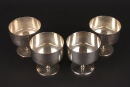 A set of four Irish silver champagne saucershallmarked Dublin 1970, the deep dished bowls supported