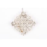 An Edwardian gold and diamond foliate brooch
set with central diamond weighing approximately 0.