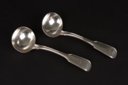 A pair of Regency silver fiddle and thread pattern sauce ladleshallmarked London 1819, with