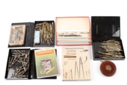 A collection of miscellaneous drawing instruments and booksincluding an assorted collection of
