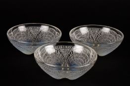 A set of 3 small Lalique Coquilles opalescent glass dishesdecorated with four scallop shaped