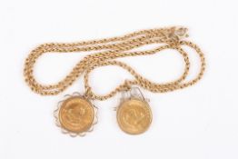 Two 1980 22ct gold 1/10 Krugerandsset in 9ct gold mounts on a 9ct gold rope twist chain., Total